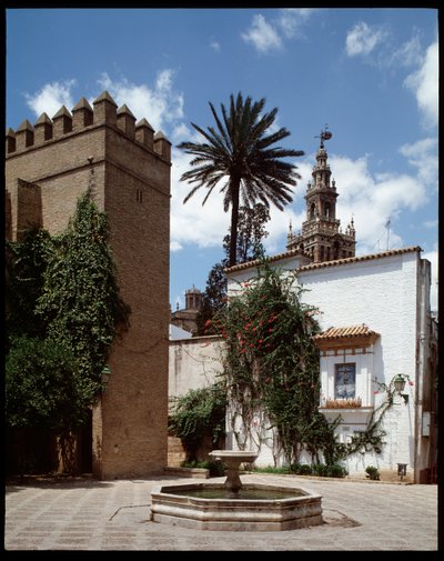 Almohadische kunst: zicht op de giralda, voormalige minaret die werd omgebouwd tot klokkentoren door School Spanish