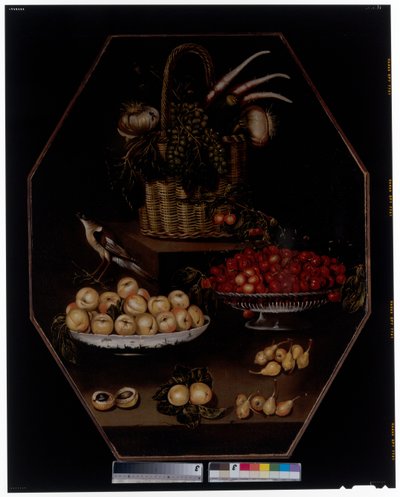 Een stilleven met granaatappels en druiven in een mand door Spanish School