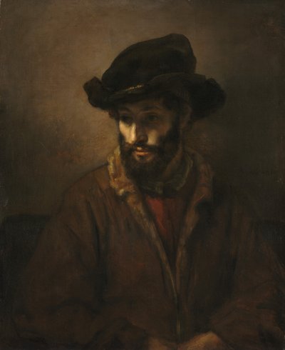 Een bebaarde man met een hoed door Studio of Rembrandt van Rijn