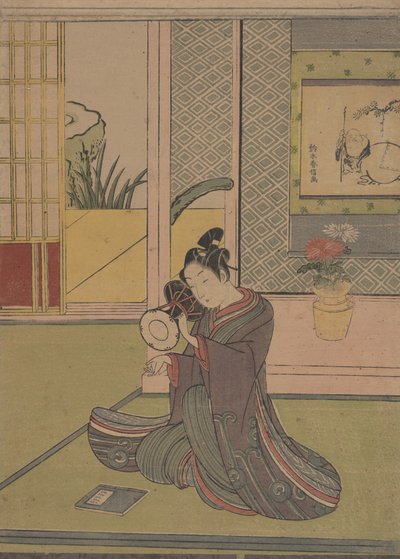 Jonge man die een Noh-drum speelt door Suzuki Harunobu