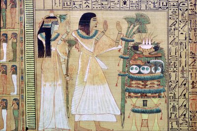 Een man en zijn vrouw die offers brengen aan Osiris, uit het Egyptische Dodenboek door Unbekannt