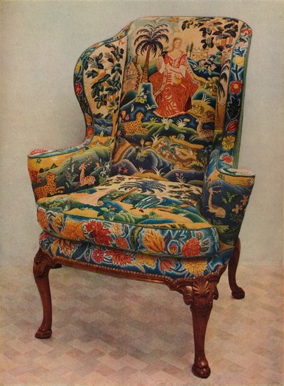 Een gestoffeerde fauteuil met vleugels, gesneden walnoothouten frame en originele zijden borduurwerk bekleding door Unbekannt