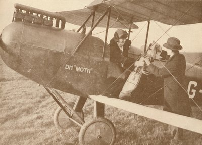 Per vliegtuig naar de golfbanen in een kleine 27-60 PK Moth Light Plane, 1927 door Unbekannt