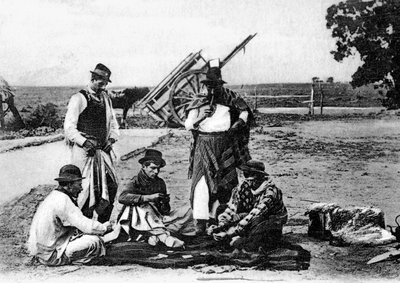 Drie mannen die kaarten spelen, Uruguay, c1900s door Unbekannt
