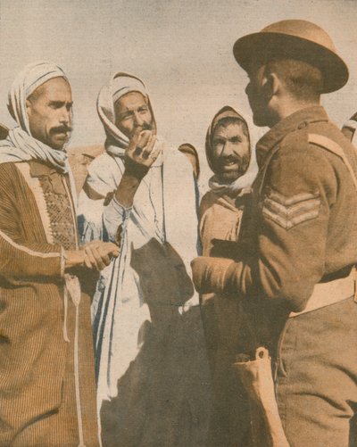 Tunesische Arabieren verwelkomen een Britse sergeant in Chaouach, 1943 door Unbekannt