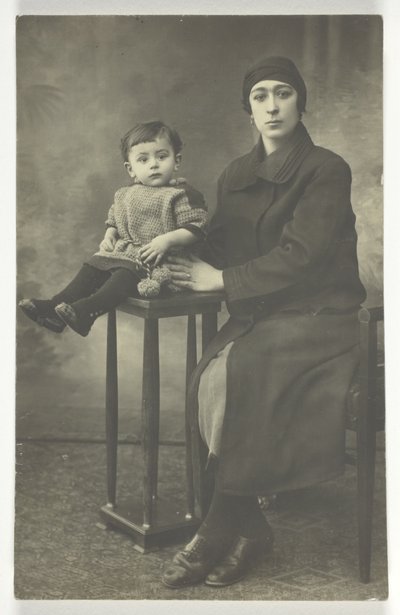 Untitled Postcard (Woman with Boy on Stand) door Unknown
