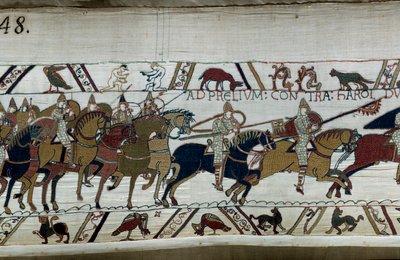 Verovering van Engeland door de Normandische hertog Willem de Veroveraar (1027-1087) in 1066: zijn leger trekt op naar dat van Harold II bij Hastings. Onderaan links, twee naakte mannen (detail) door Unknown artist