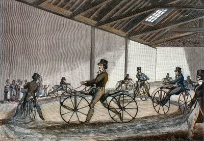 Interne weergave van de manege voor hobbelpaard. Man die fietsen bestuurt (fietsen zonder pedalen uitgevonden door Baron Karl Drais) door Unknown artist