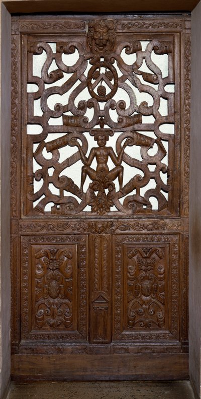 Houten gesneden deur met skelet door Unknown artist