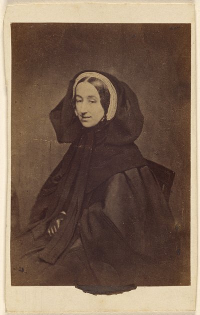 [Ongeïdentificeerde vrouw in donkere kleding, zittend]. door Unknown artist