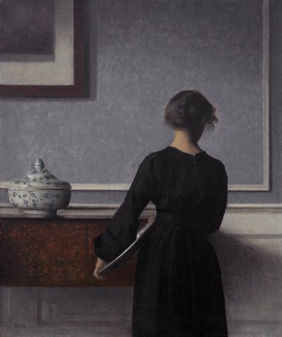 Interieur met jonge vrouw van achteren door Vilhelm Hammershøi