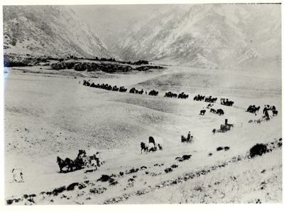 Pioniers die immigranten van het treinstation ophalen en naar de Mormoonse Salt Lake City leiden door William Henry Jackson