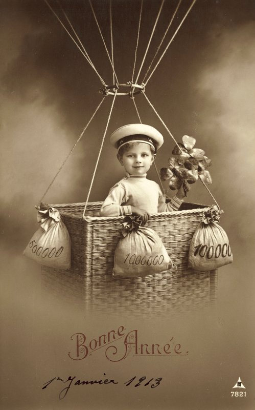 1913 Nieuwjaarskaart, met jongen die een ballon opstijgt, met veel geld als ballast door French Photographer