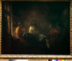 De pelgrims van Emmaus. Christus verschijnt aan de pelgrims zittend aan een tafel in een herberg in Emmaus. Schilderij van de werkplaats van Harmensz van Rijn genaamd Rembrandt (1606-1669)