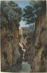 Uitzicht op een waterval door een ravijn