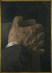Mannelijke hand die een paneel vasthoudt
