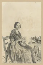 Pauline Martini, geboren Dambke, zittend aan tafel, met haar blik op de toeschouwer gericht