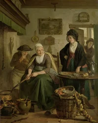 Vrouw bakt pannenkoeken