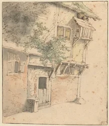 Gevel van een begroeid huis
