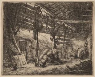 Interieur van een schuur met een werkende boerenvrouw