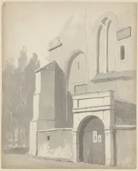 Gezicht op een ingangspoortje van een kerk