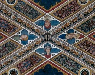 Hoofden en plantmotieven (detail)