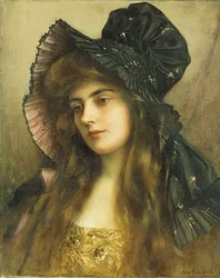 Een jonge schoonheid met een zwarte hoed