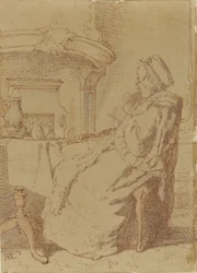 Zittende, breiende oude vrouw aan een tafel