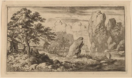 Puntige rots aan de oever van een rivier