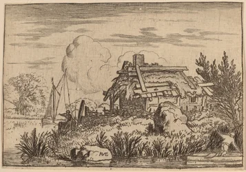 Vervallen huisje, omgeven door water