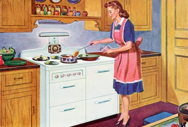 Huisvrouw uit de jaren 40 kookt diner in haar droomkeuken
