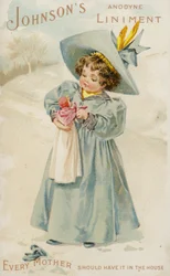 Meisje houdt pop vast in de sneeuw