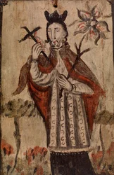 Mannelijke figuur met kruis