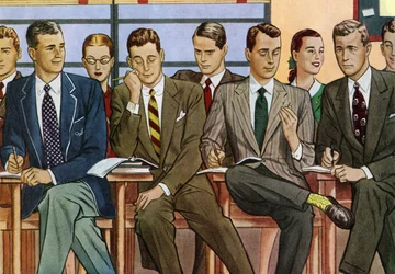 Studenten aan bureaus zittend in een collegezaal uit 1940