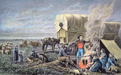 Wagenemigranten naar het westen (gekleurde gravure)