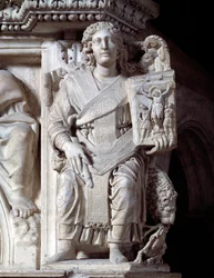 Gotische kunst: de aartsengel Michaël houdt een tablet met kruisiging vast. Sculptuur van de preekstoel