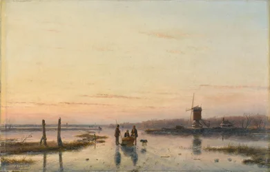 Molen naast een bevroren rivier