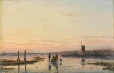 Windmolen naast een bevroren rivier