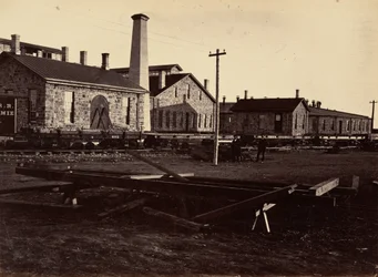 Plaat 17. Laramie Machine Shops, vanuit het zuidwesten,1869 (foto)