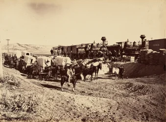Plaat 27. Bevoorradingstreinen,1869 (foto)