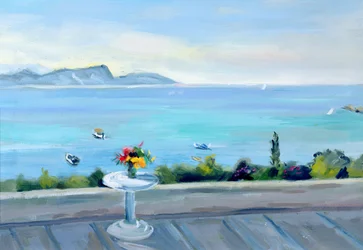Een terras met uitzicht op zee