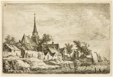 De kerktoren in het dorp aan zee