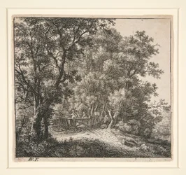 Twee mannen bij een hek