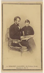 President Lincoln leest de bijbel voor aan zijn zoon Tad