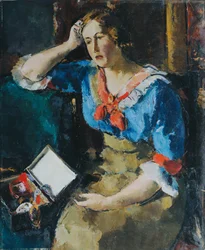 Zittende dame in blauwe blouse