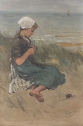 Meisje dat breit in de duinen