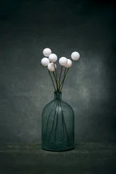 Rustig stilleven met groene fles