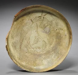 Diep bord met havik, konijn en gebladerte, 1100s