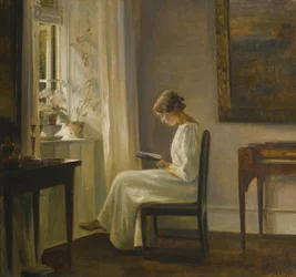Interieur met een lezende vrouw