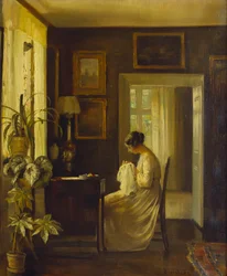 Een interieur met een vrouw die naait